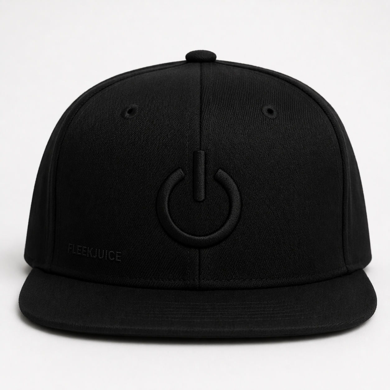 Black snapback hat with power symbol embroidery and flat brim on white background