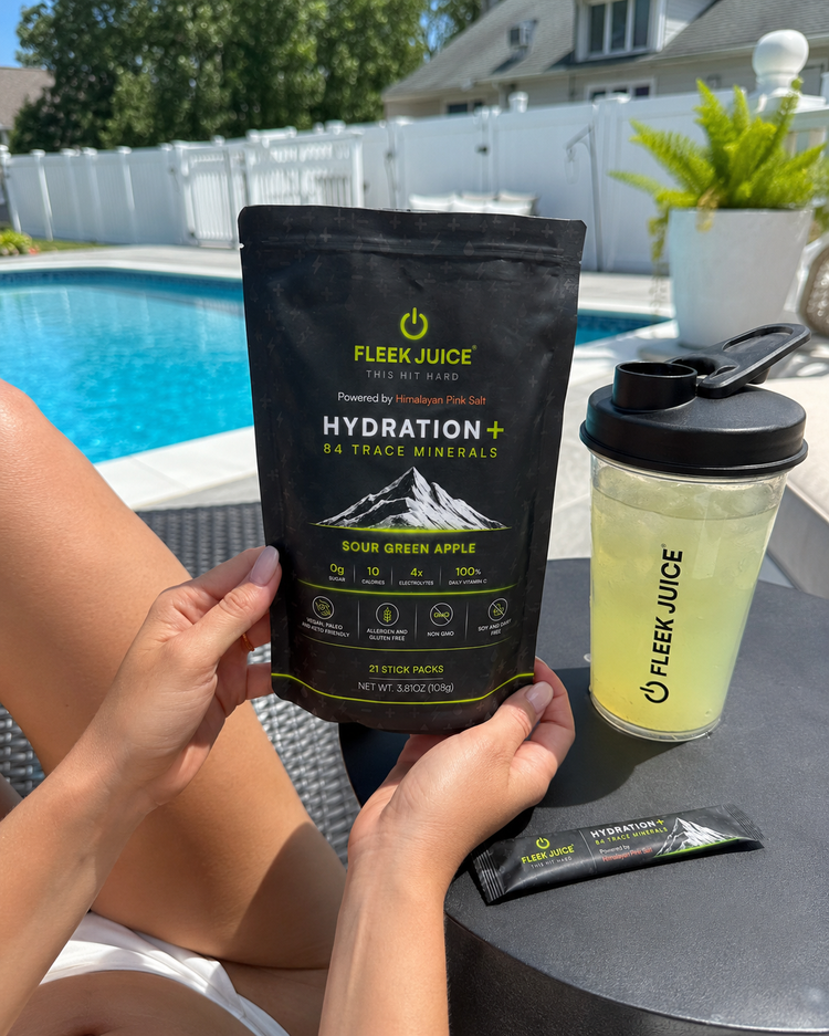 Hydration supplement powder with shaker by a pool, sour green apple flavor, summer setting
